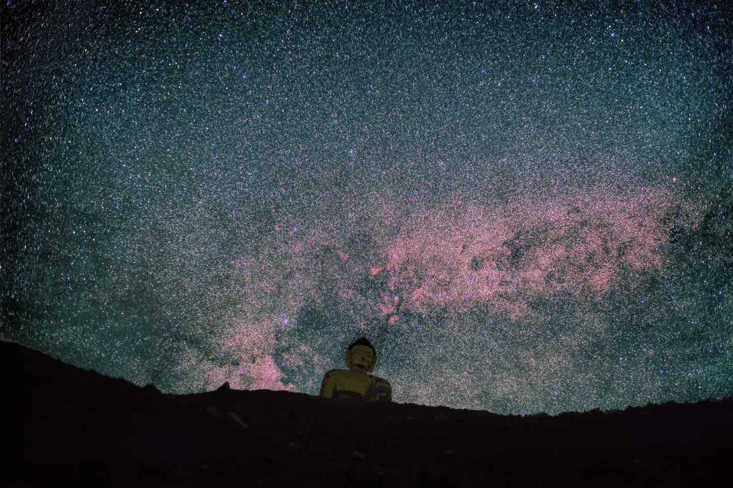 *The Cygnus region rising above the Buddha statue in Langza*