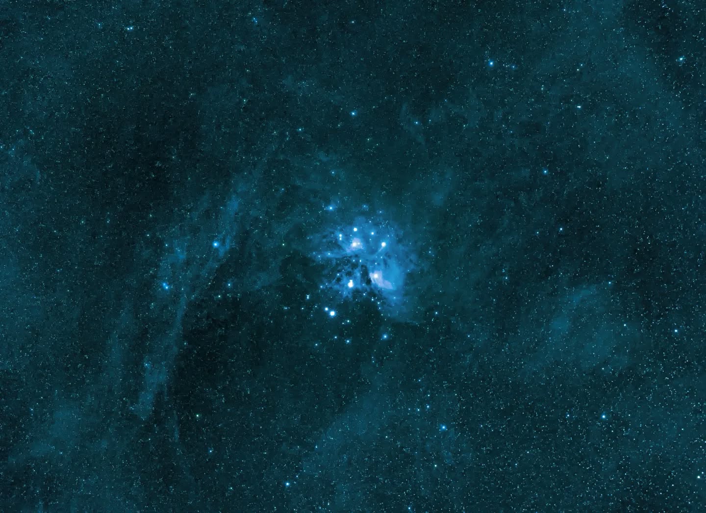 *The Pleiades star cluster and surrounding nebulosity in a different colour palette.*